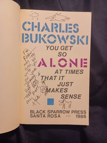 You Get So Alone at Times That It Just Makes Sense by Charles Bukowski. INSCRIBED by Bukowski
