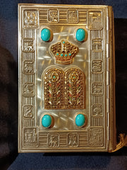 Torah with Hinged metal covers.