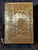 Torah with Hinged metal covers.